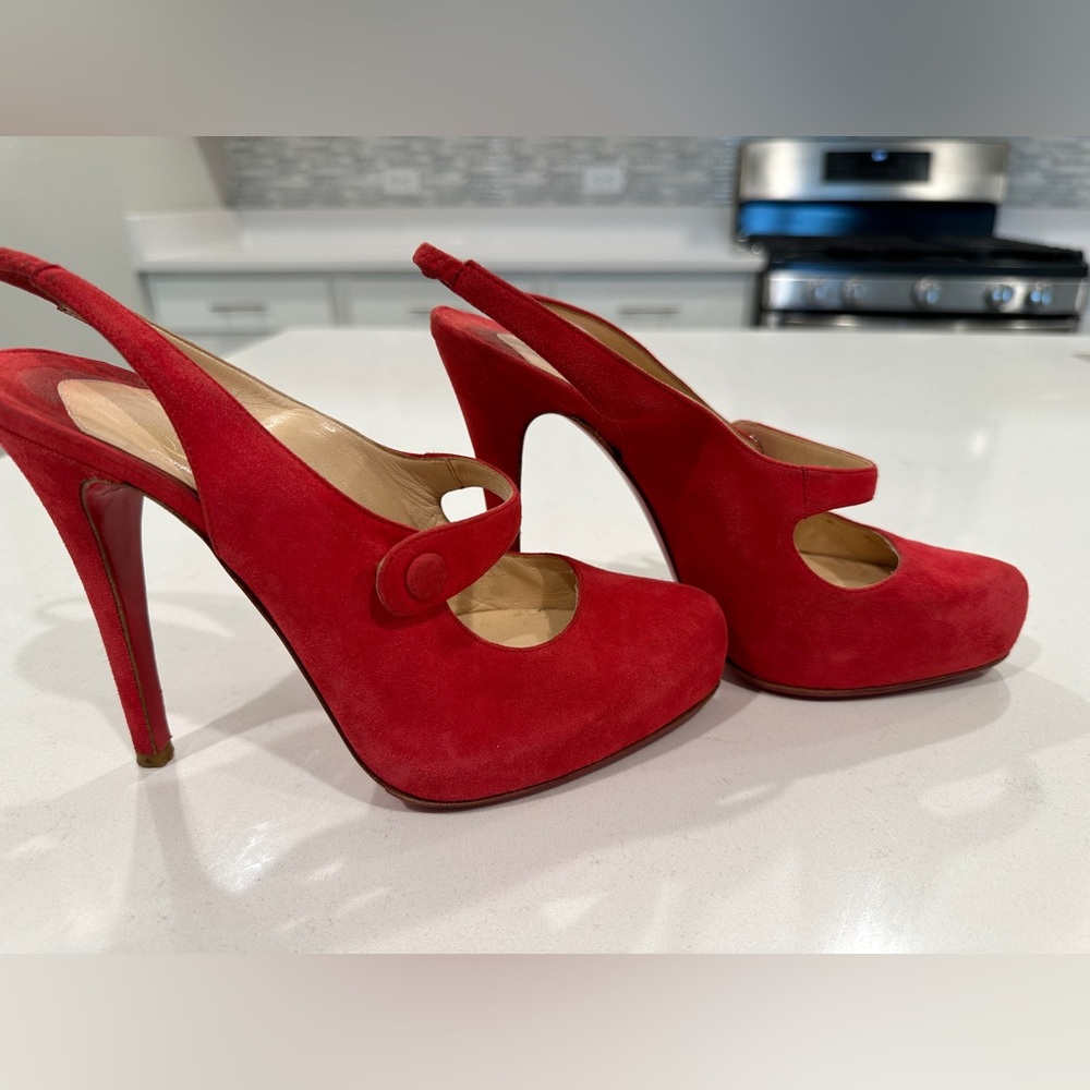 CHRISTIAN LOUBOUTIN SUEDE ROLANDE MARY
JANE HEELS